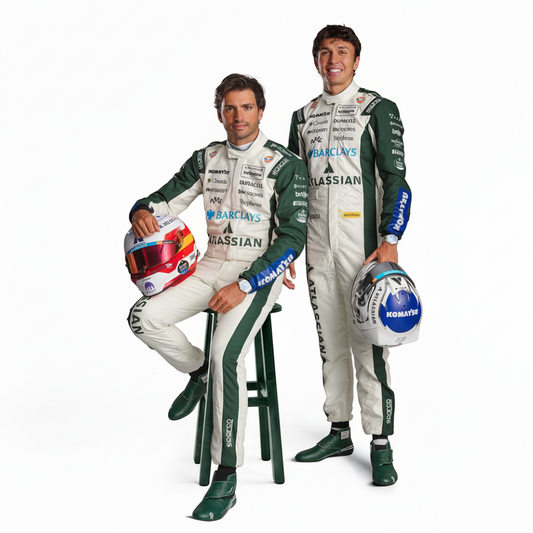 Two race drivers in green and white Williams racing suits pose with helmets against a light beige studio background. One driver sits on a green stool while the other stands beside him.